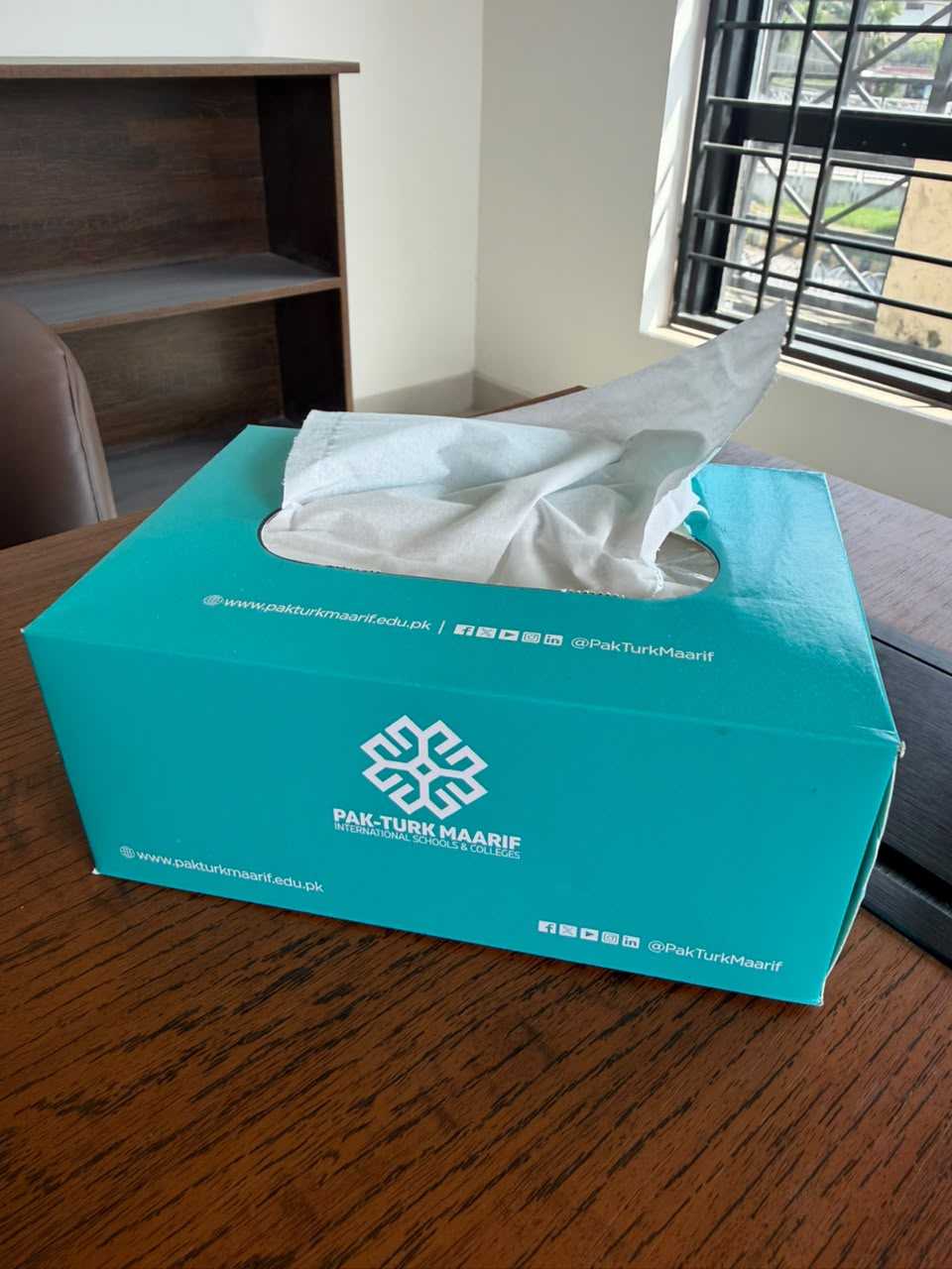 Pak-Turk Maarif tissue box, front view with the school logo